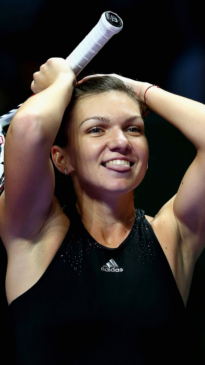 Frau im Schwarzen Trägershirt Mit Rotem Und Weißem Tennisschläger. Wallpaper in 720x1280 Resolution