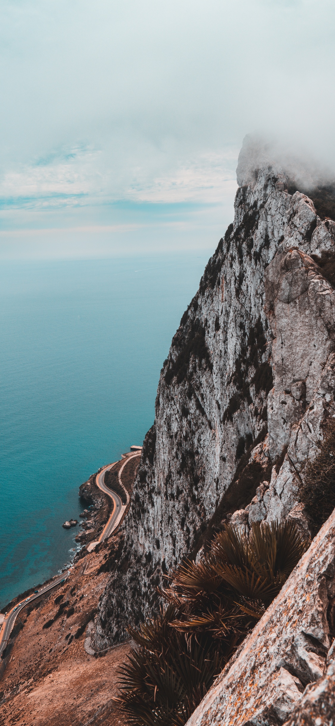 Mountain, Sky, Cliff, Sea, Promontory. Wallpaper in 1125x2436 Resolution
