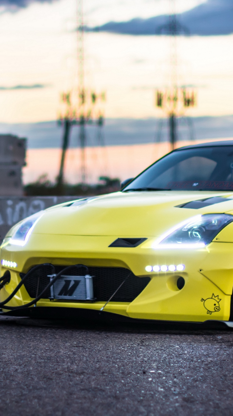 Lamborghini Aventador Jaune Sur Route Pendant la Journée. Wallpaper in 750x1334 Resolution