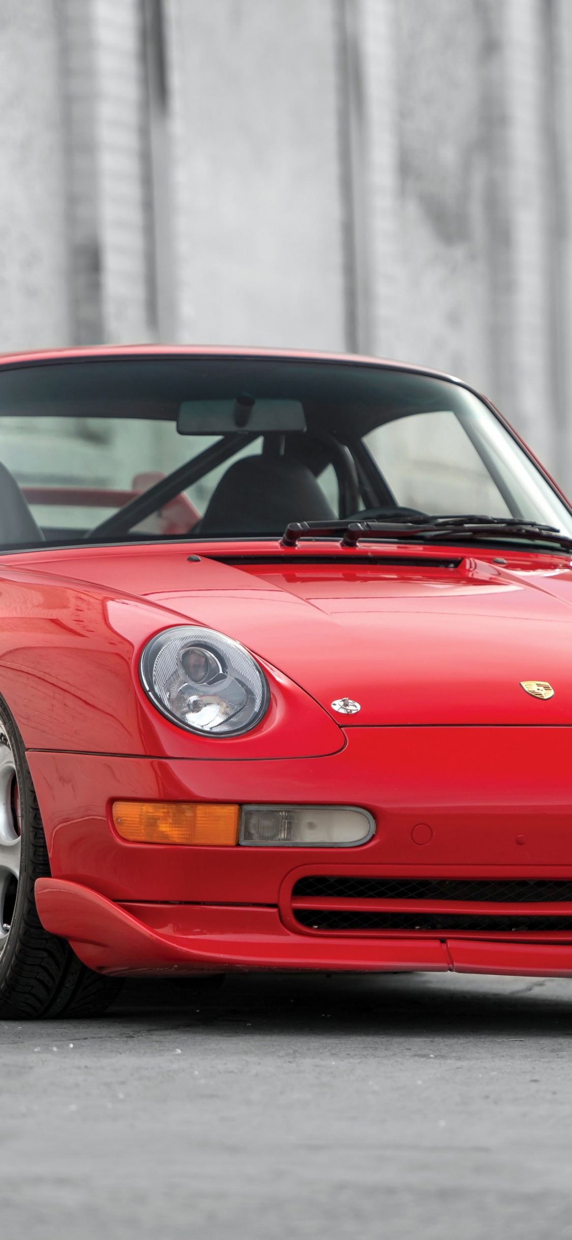 Roter Ferrari 458 Italia Tagsüber Unterwegs. Wallpaper in 1125x2436 Resolution