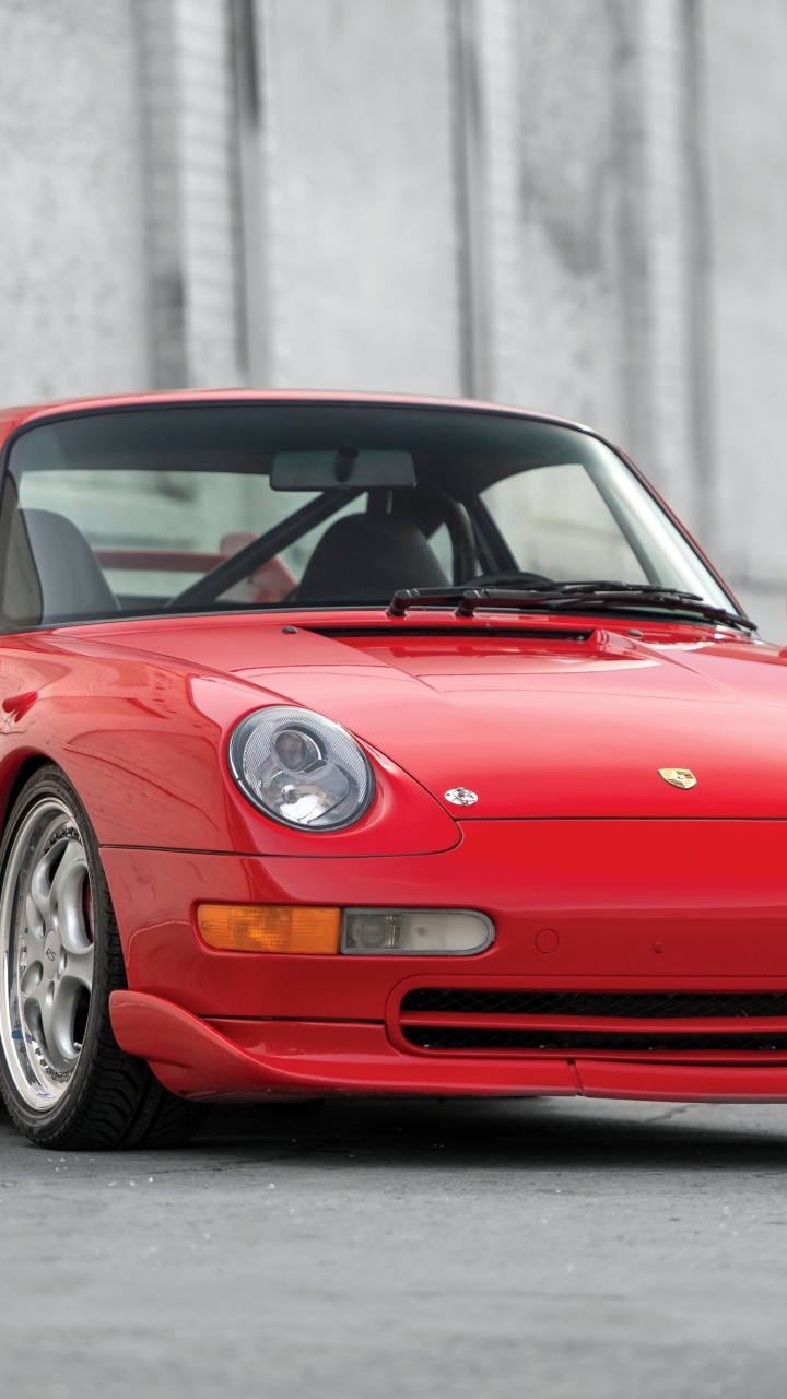 Roter Ferrari 458 Italia Tagsüber Unterwegs. Wallpaper in 720x1280 Resolution