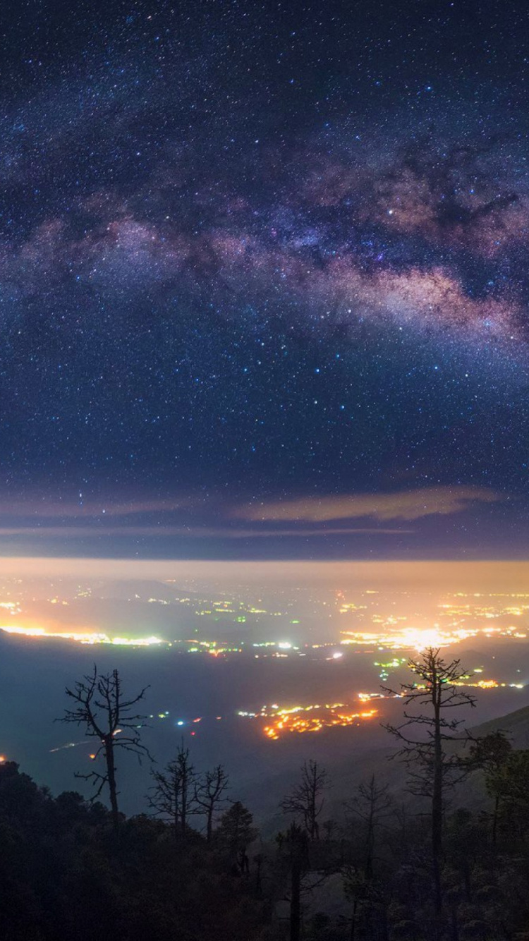 Silhouette of Trees Under Blue Sky and White Clouds During Night Time. Wallpaper in 750x1334 Resolution