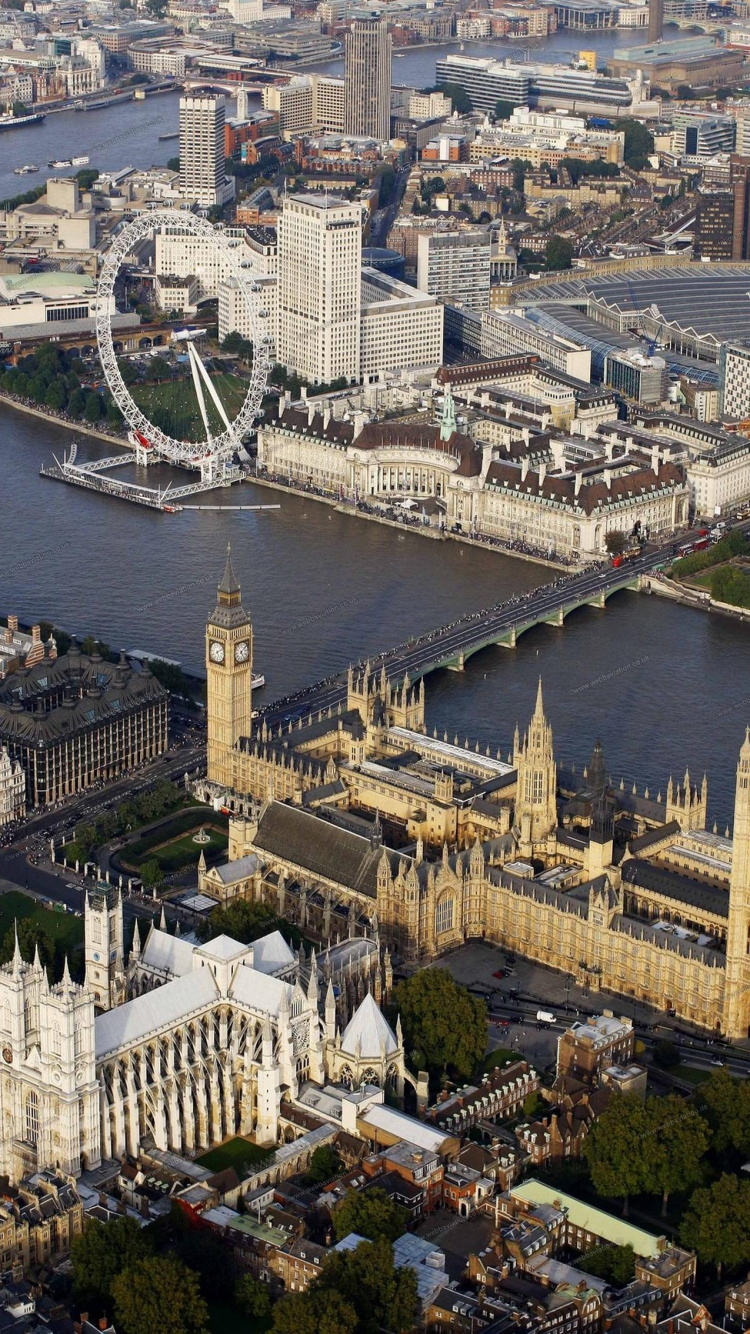 Luftaufnahme Von Stadtgebäuden Tagsüber. Wallpaper in 750x1334 Resolution