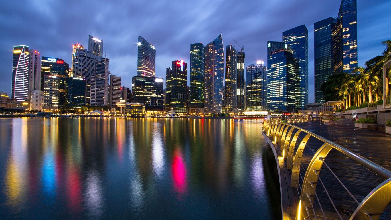 City Skyline Across Body of Water During Night Time. Wallpaper in 1366x768 Resolution