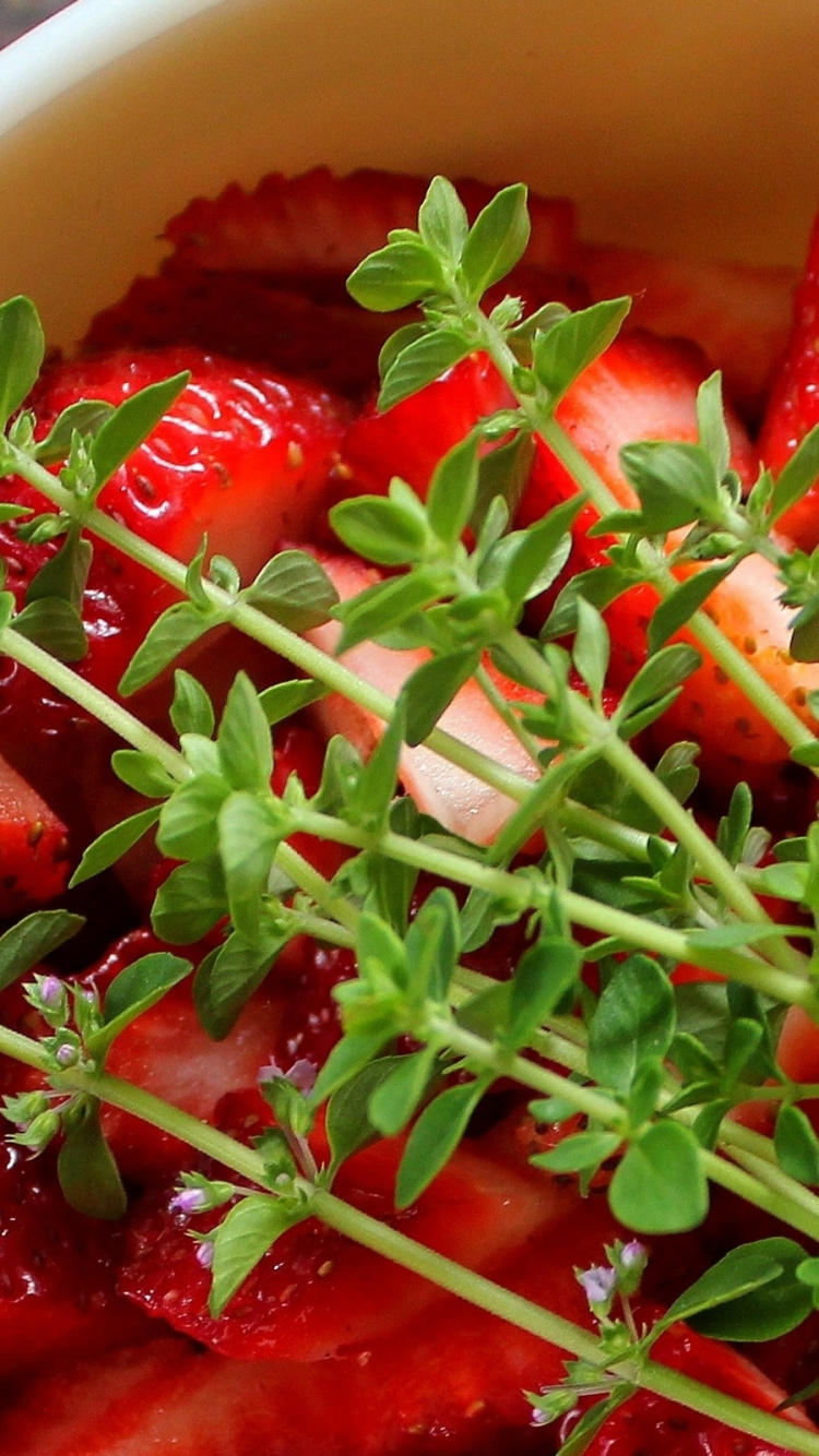 Sliced Strawberries in White Ceramic Bowl. Wallpaper in 750x1334 Resolution
