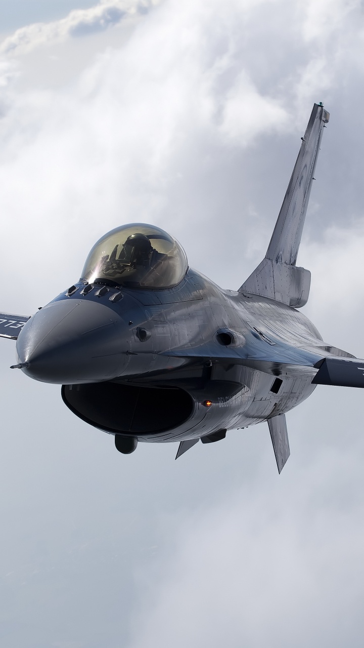 Black and Yellow Jet Plane in Mid Air. Wallpaper in 720x1280 Resolution