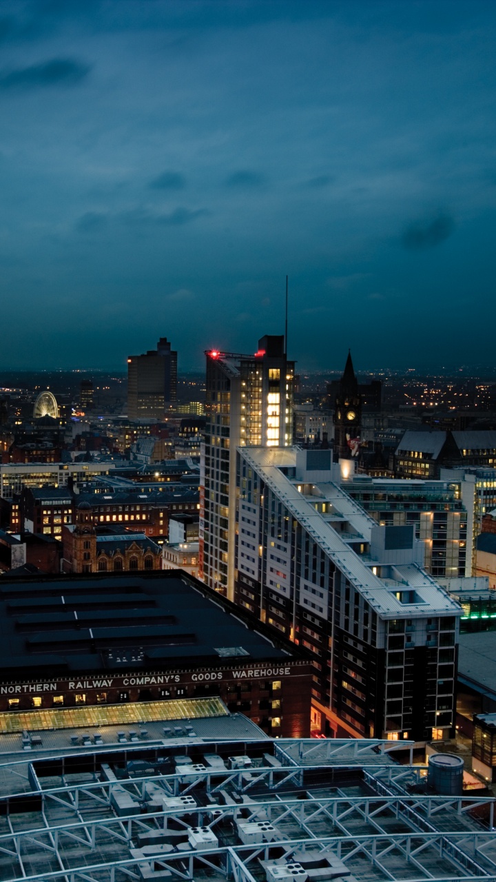 City With High Rise Buildings During Night Time. Wallpaper in 720x1280 Resolution