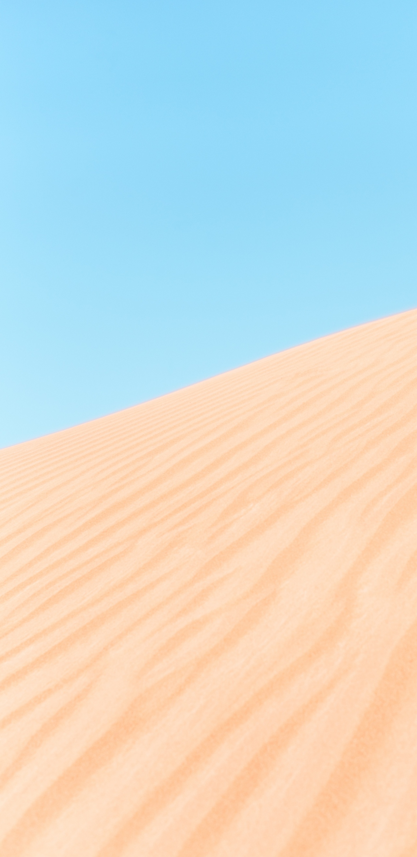 Brown Sand Under Blue Sky During Daytime. Wallpaper in 1440x2960 Resolution