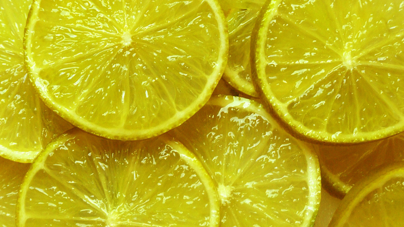 Close up Photo of Sliced Lemon. Wallpaper in 1366x768 Resolution