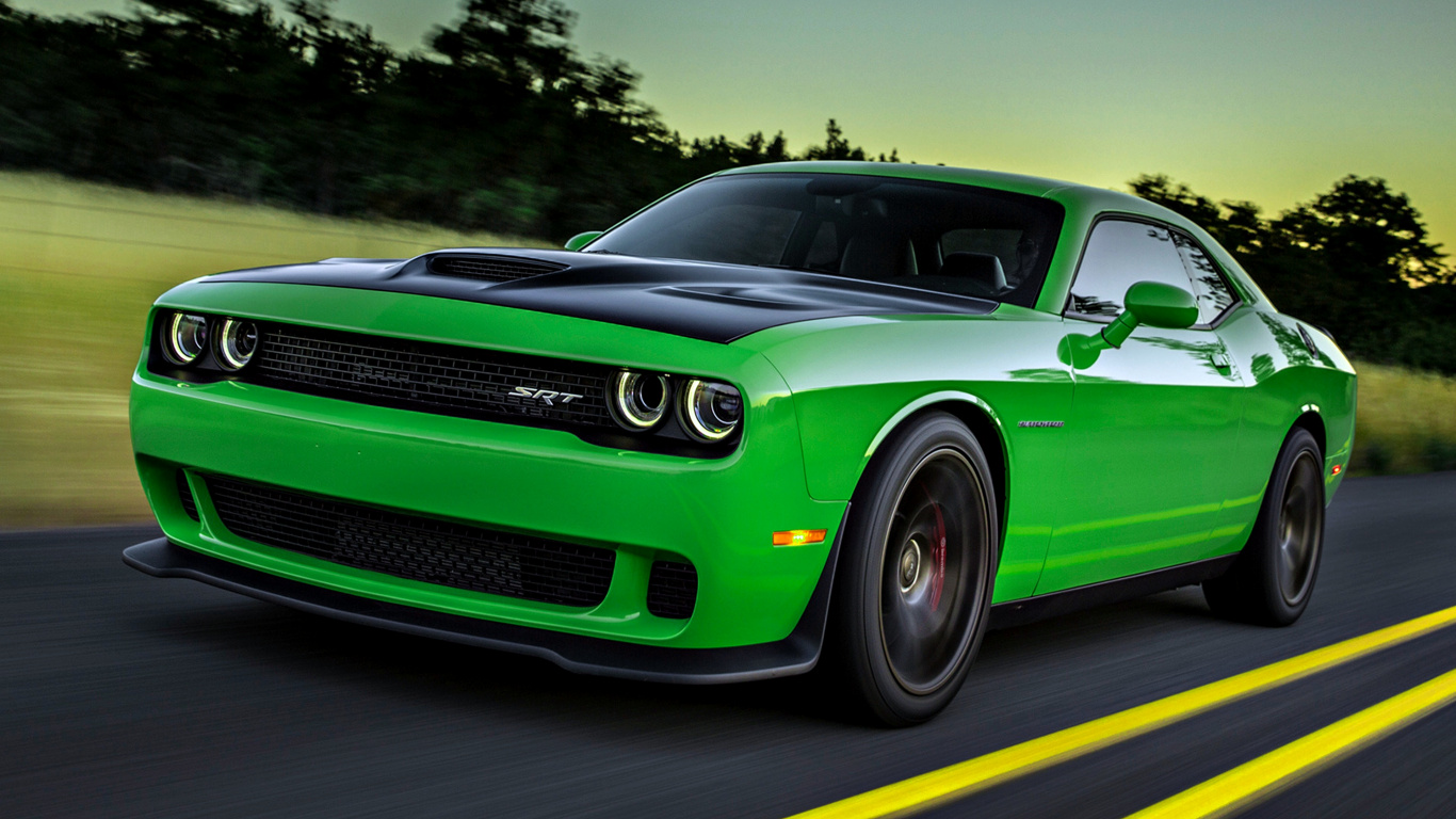 Green Chevrolet Camaro on Road During Daytime. Wallpaper in 1366x768 Resolution