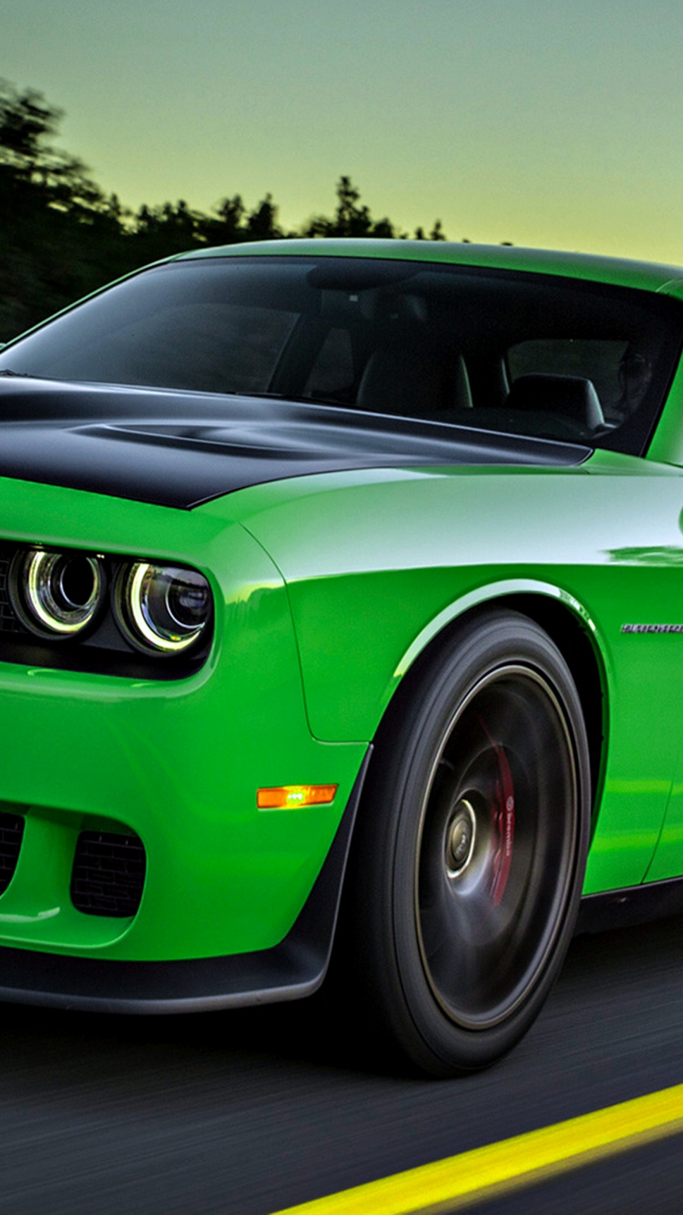 Green Chevrolet Camaro on Road During Daytime. Wallpaper in 750x1334 Resolution