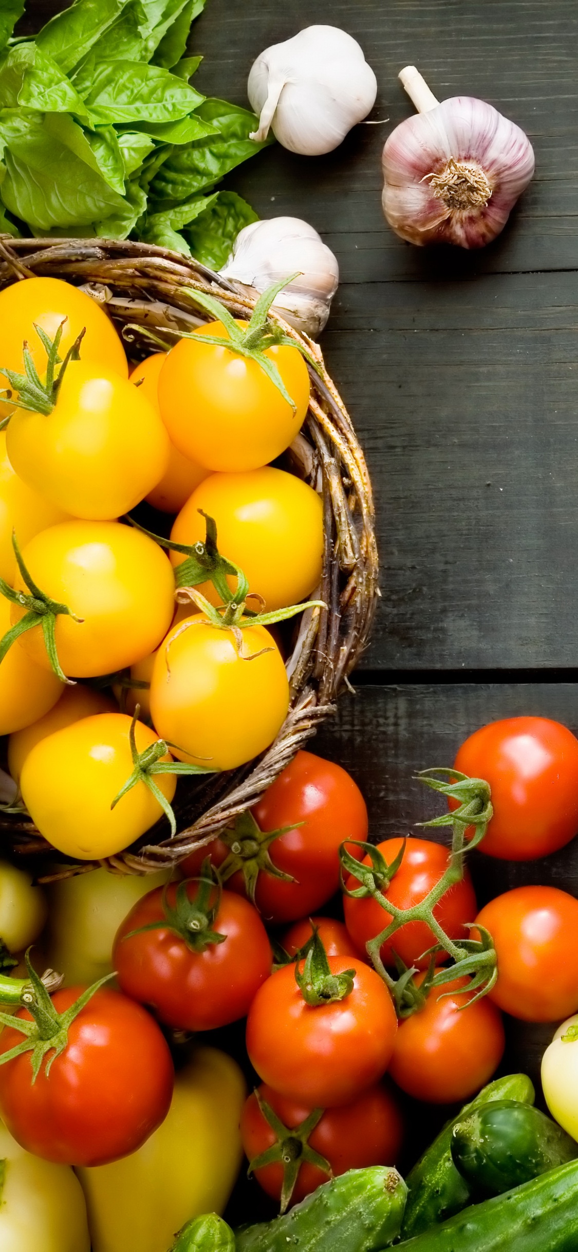 Yellow Red and Green Bell Peppers and Garlic on Brown Wooden Table. Wallpaper in 1125x2436 Resolution