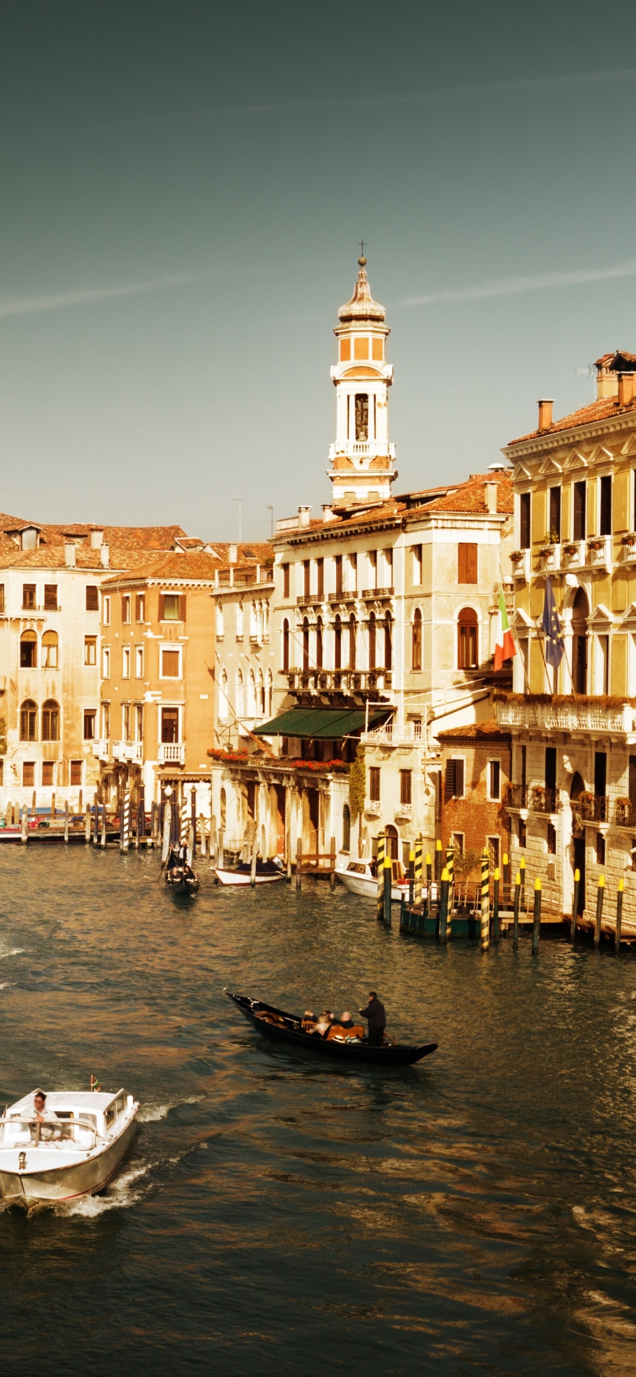 White Boat on Water Near Concrete Building During Daytime. Wallpaper in 1242x2688 Resolution