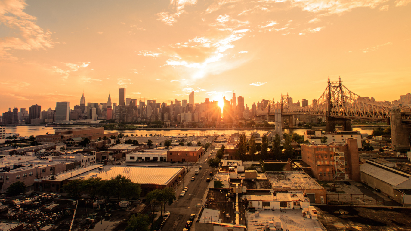 City With High Rise Buildings Under Blue Sky During Daytime. Wallpaper in 1366x768 Resolution