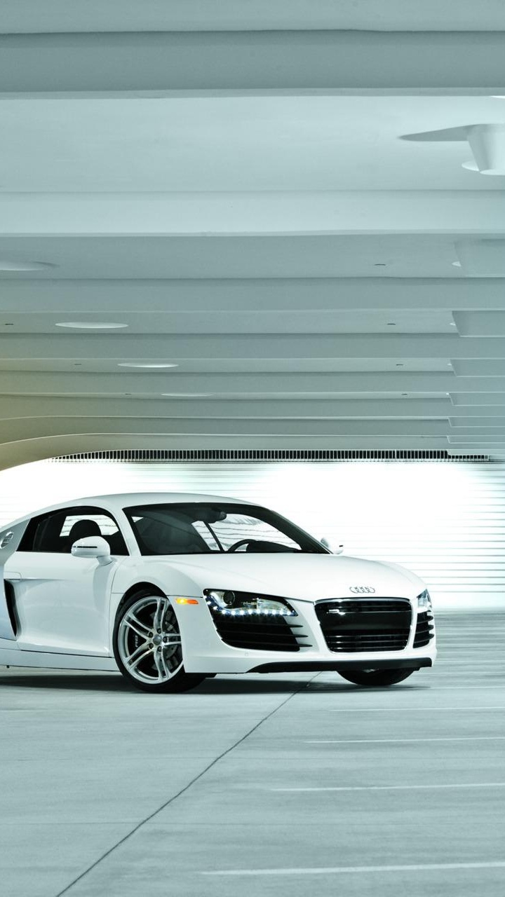 White Porsche 911 Parked in Garage. Wallpaper in 720x1280 Resolution