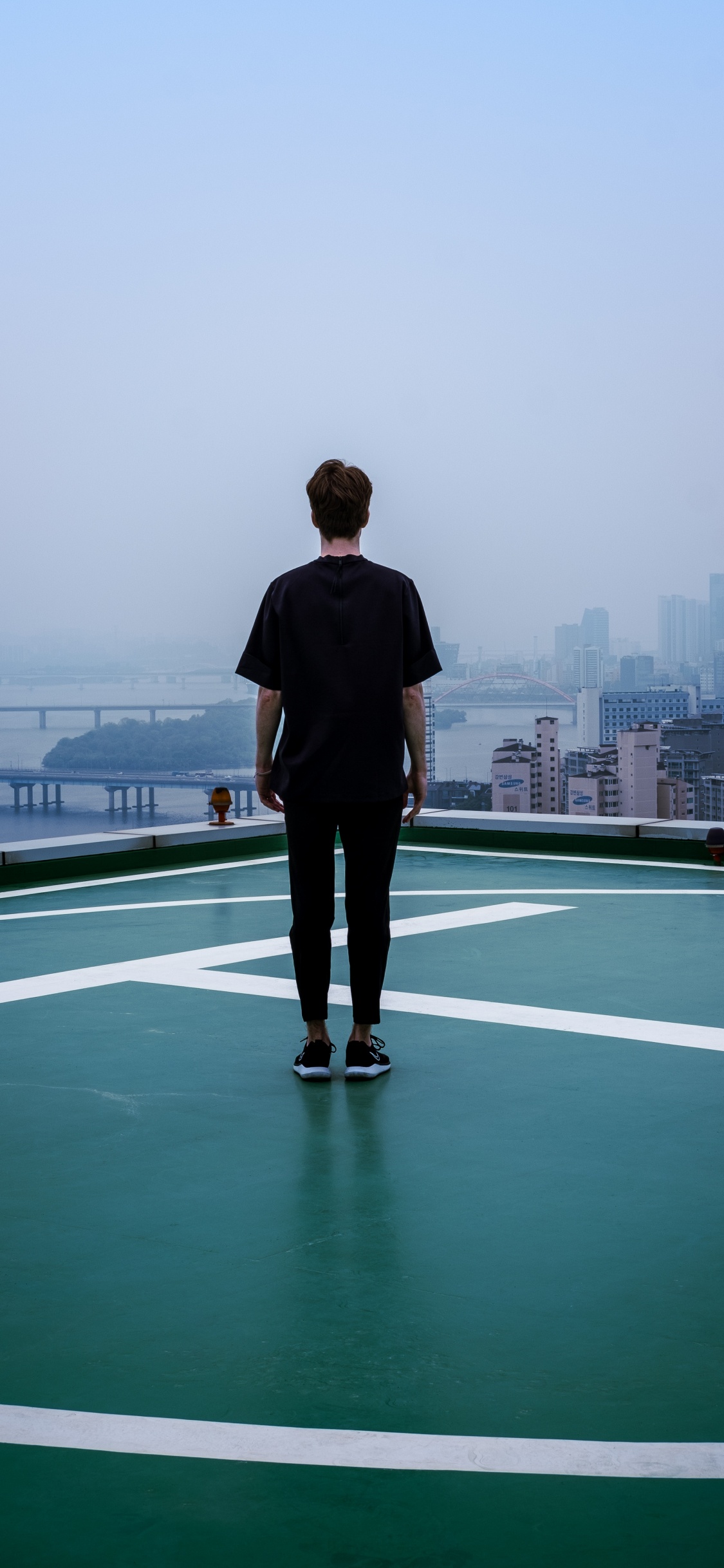 South Korea, Standing, Architecture, City, Footwear. Wallpaper in 1125x2436 Resolution