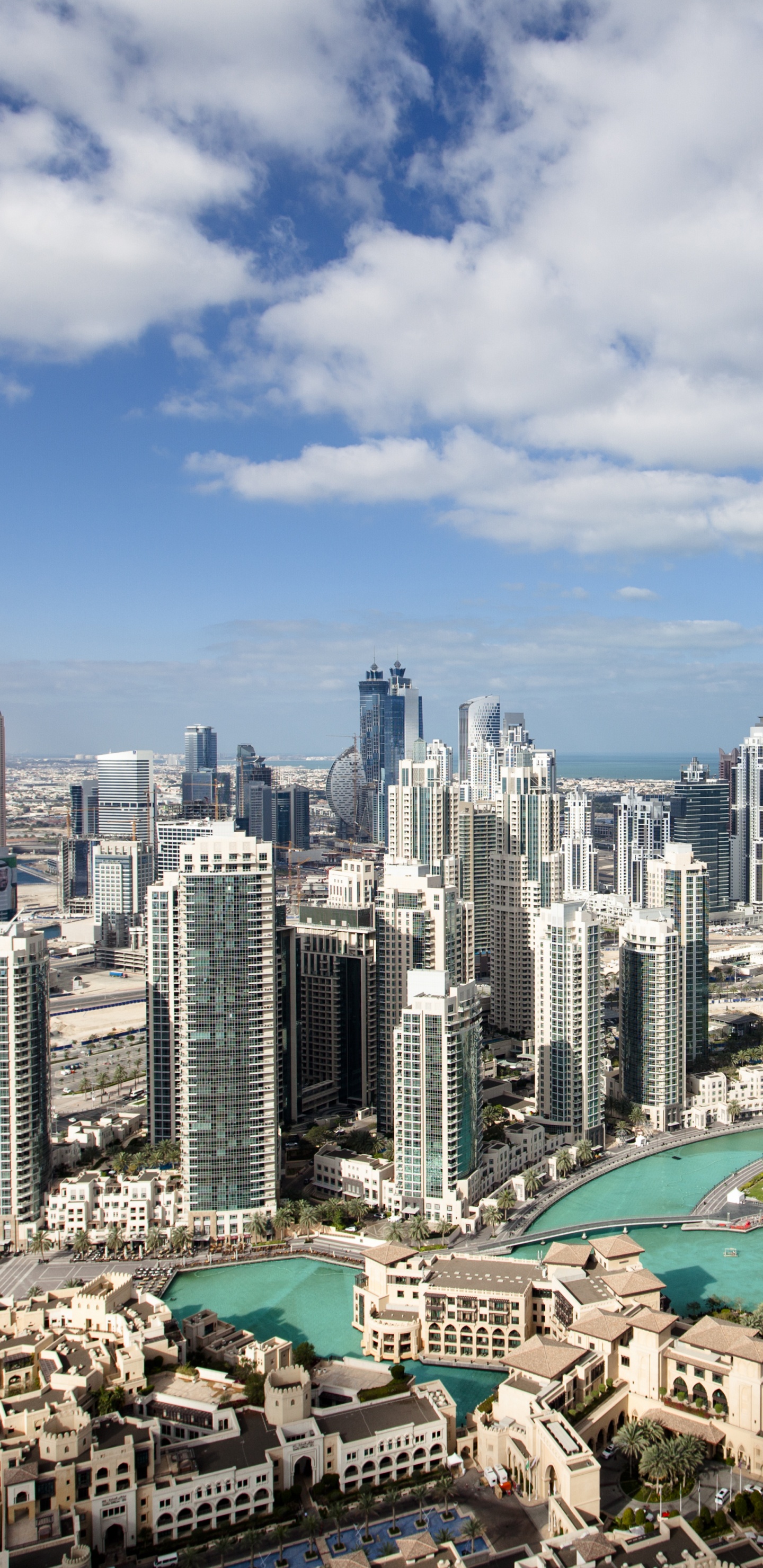 City Skyline Under Blue and White Sunny Cloudy Sky During Daytime. Wallpaper in 1440x2960 Resolution