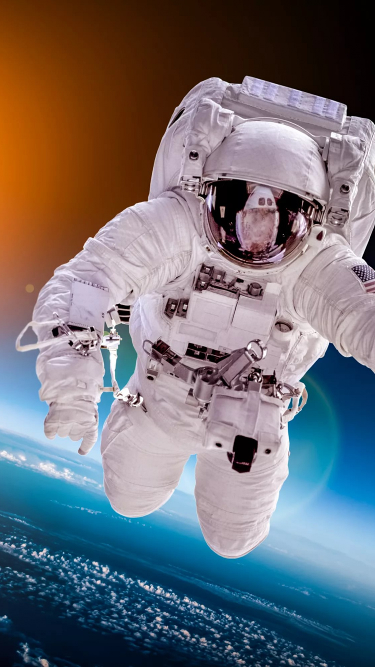 Persona en Traje Blanco y Negro Con Casco Negro en el Campo de Nieve Blanca Durante el Día. Wallpaper in 750x1334 Resolution