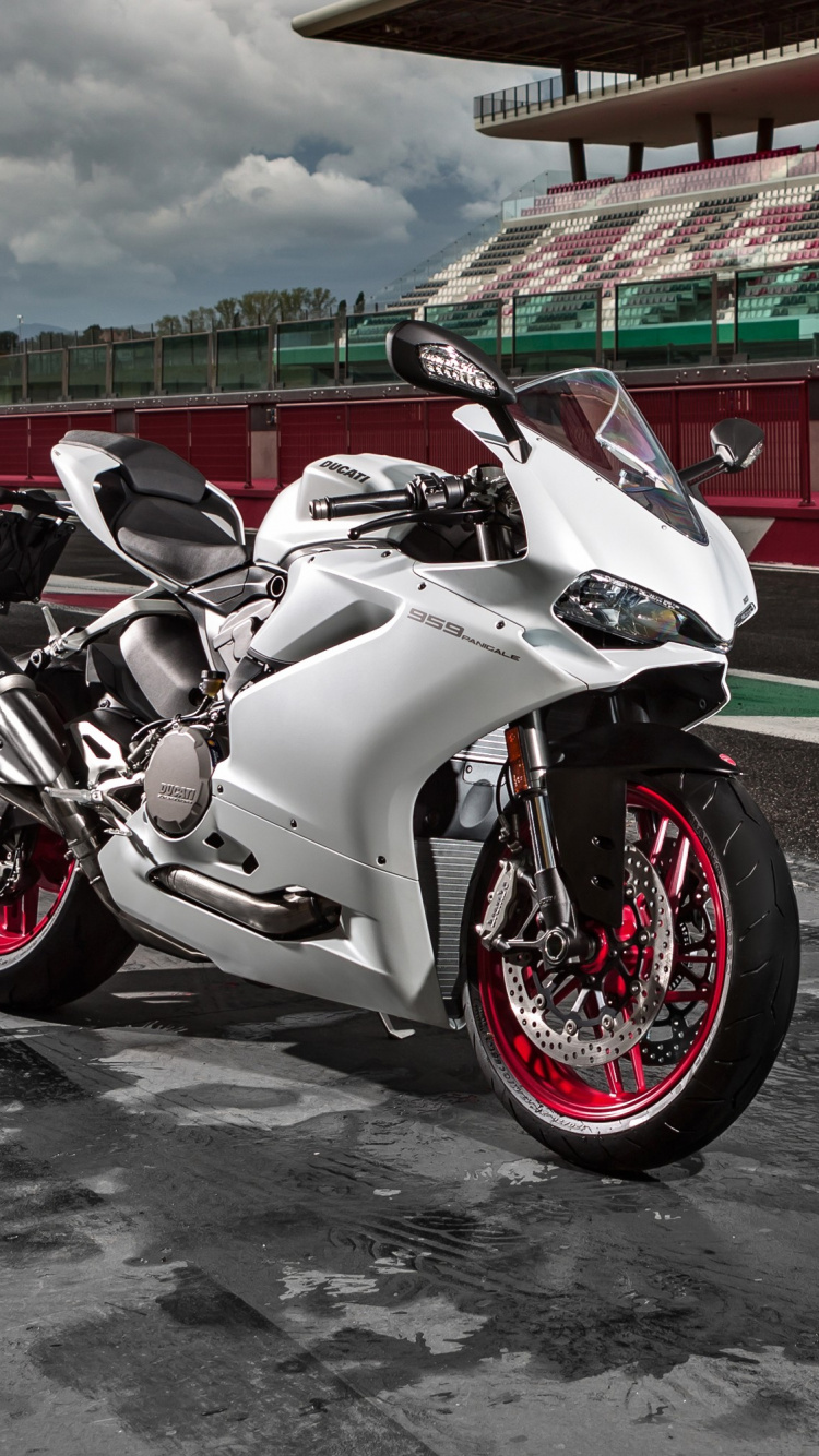 White Sports Bike Parked on Parking Lot During Daytime. Wallpaper in 750x1334 Resolution
