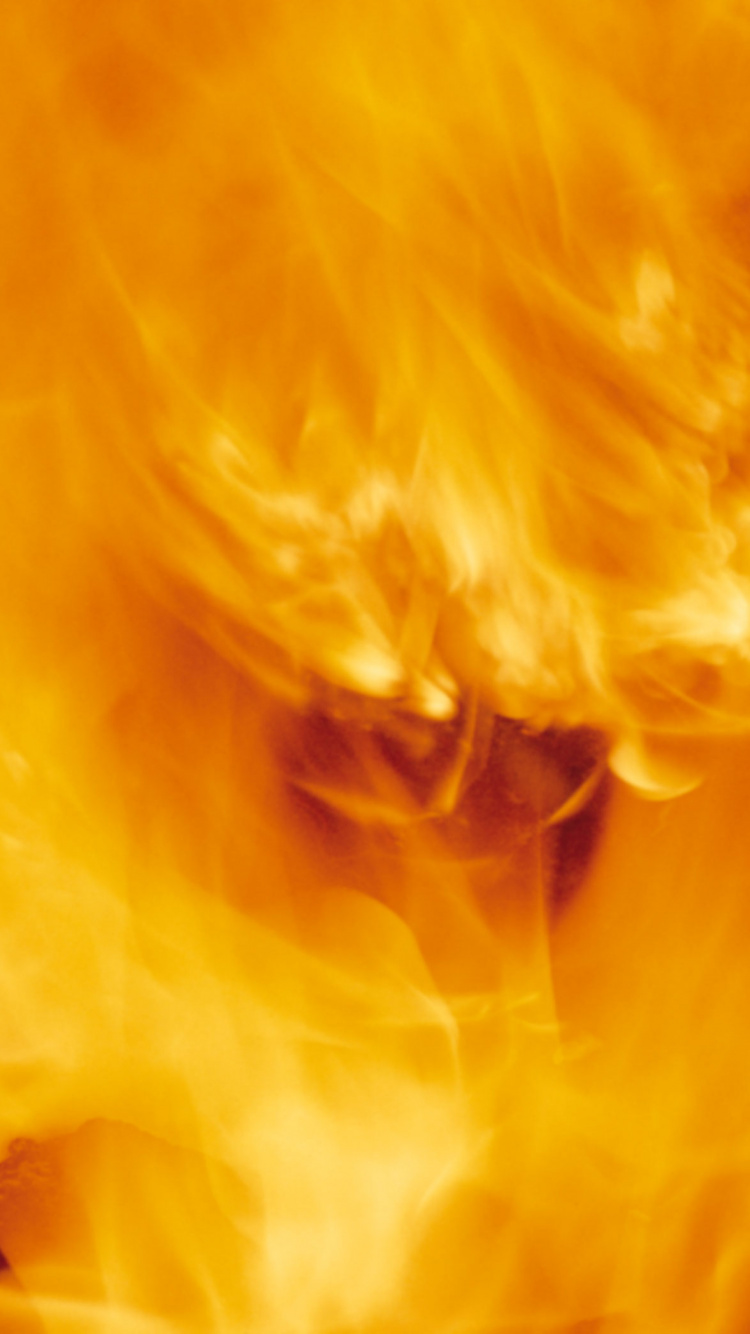 Yellow Smoke in Close up Photography. Wallpaper in 750x1334 Resolution