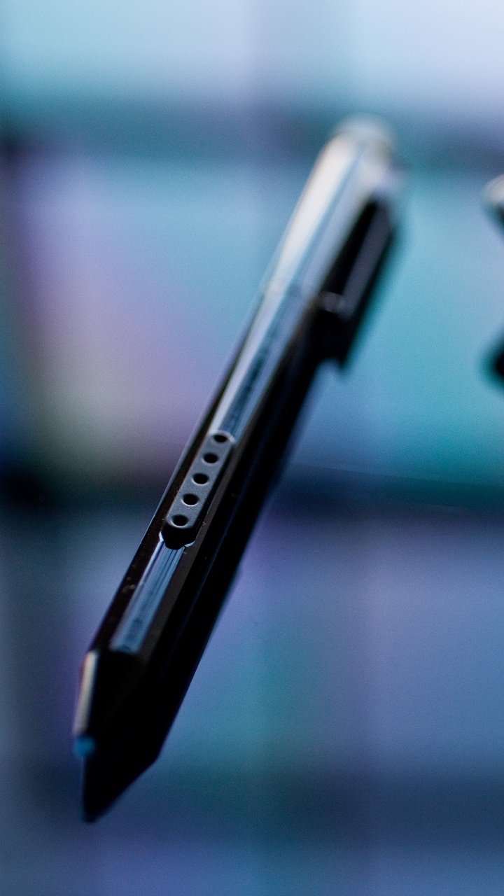 Black Ipad on White Table. Wallpaper in 720x1280 Resolution