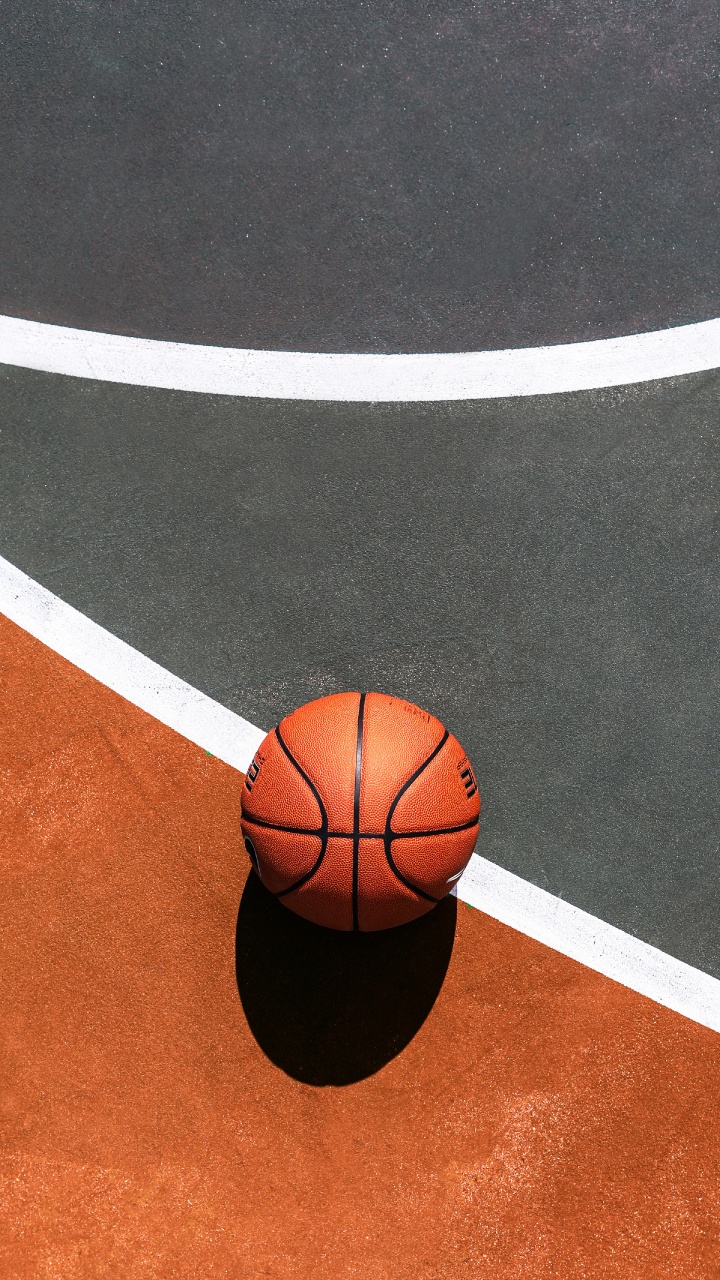 Basketball on Blue and White Basketball Court. Wallpaper in 720x1280 Resolution