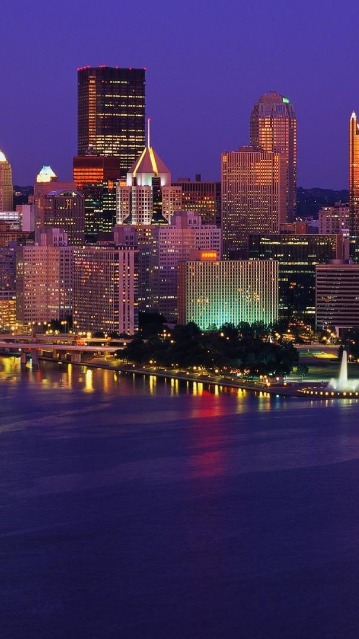 City Skyline During Night Time. Wallpaper in 720x1280 Resolution