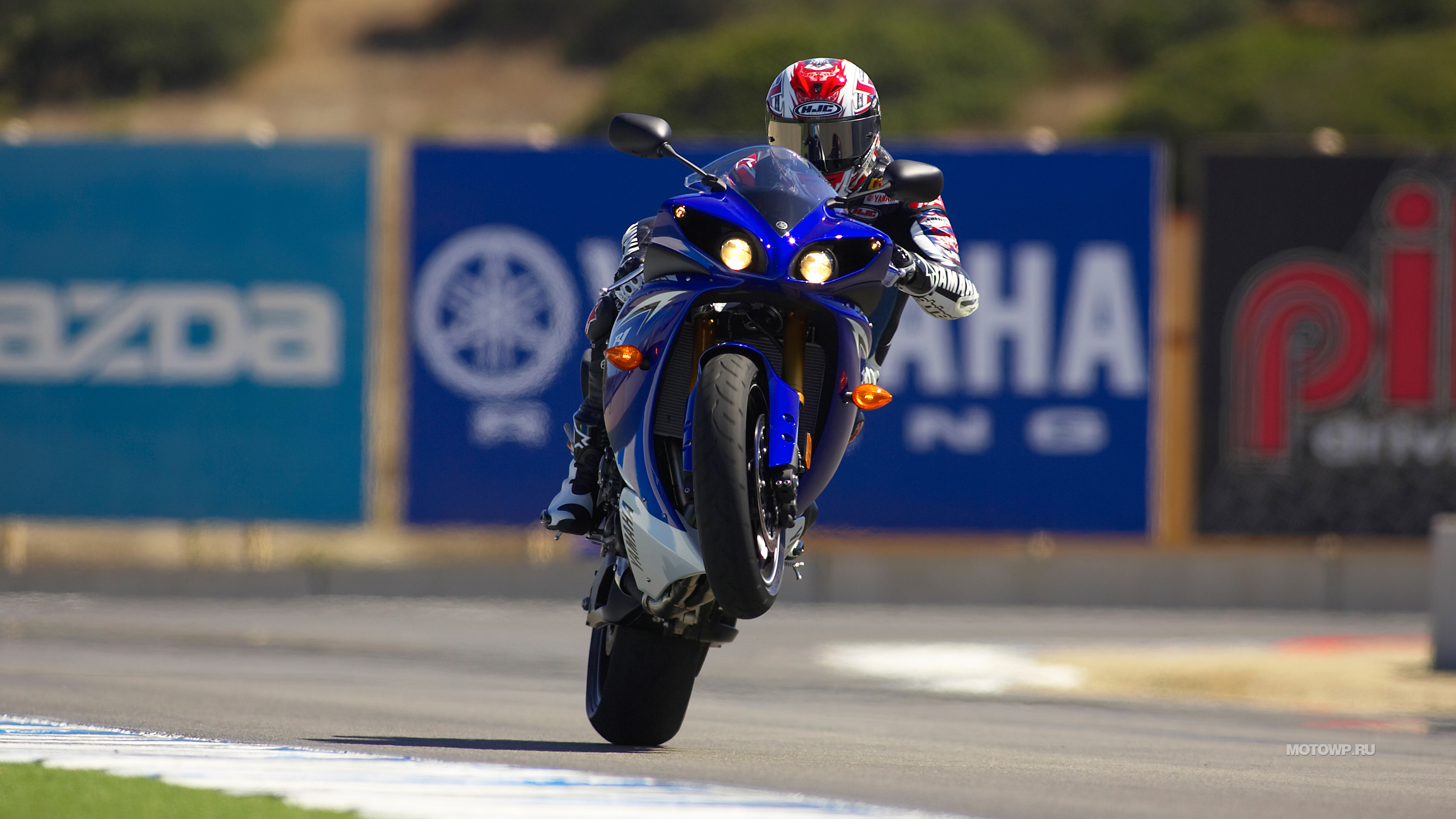 Man in Blue and Red Motorcycle Helmet Riding Blue and White Sports Bike. Wallpaper in 3840x2160 Resolution