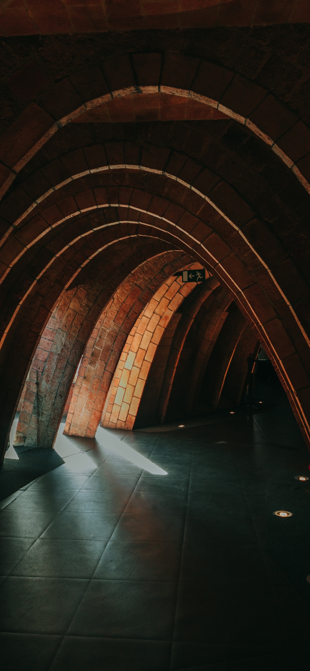 Brown and Gray Tunnel With Lights. Wallpaper in 1242x2688 Resolution