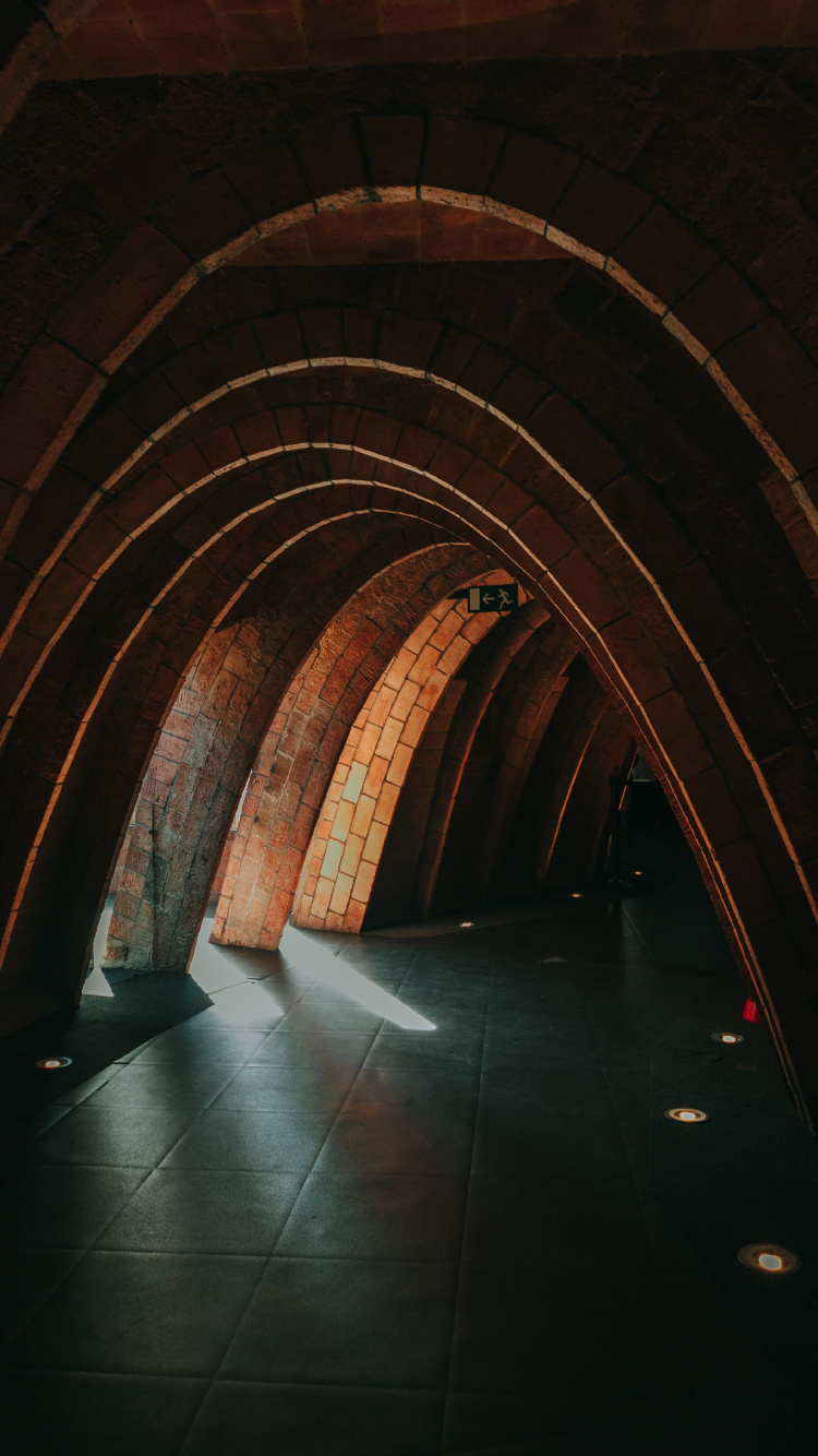 Brown and Gray Tunnel With Lights. Wallpaper in 750x1334 Resolution