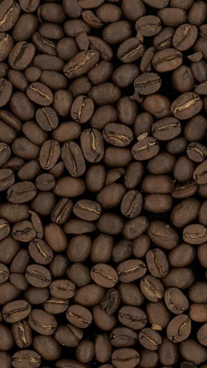 Kaffeebohnen Auf Brauner Holzoberfläche. Wallpaper in 720x1280 Resolution