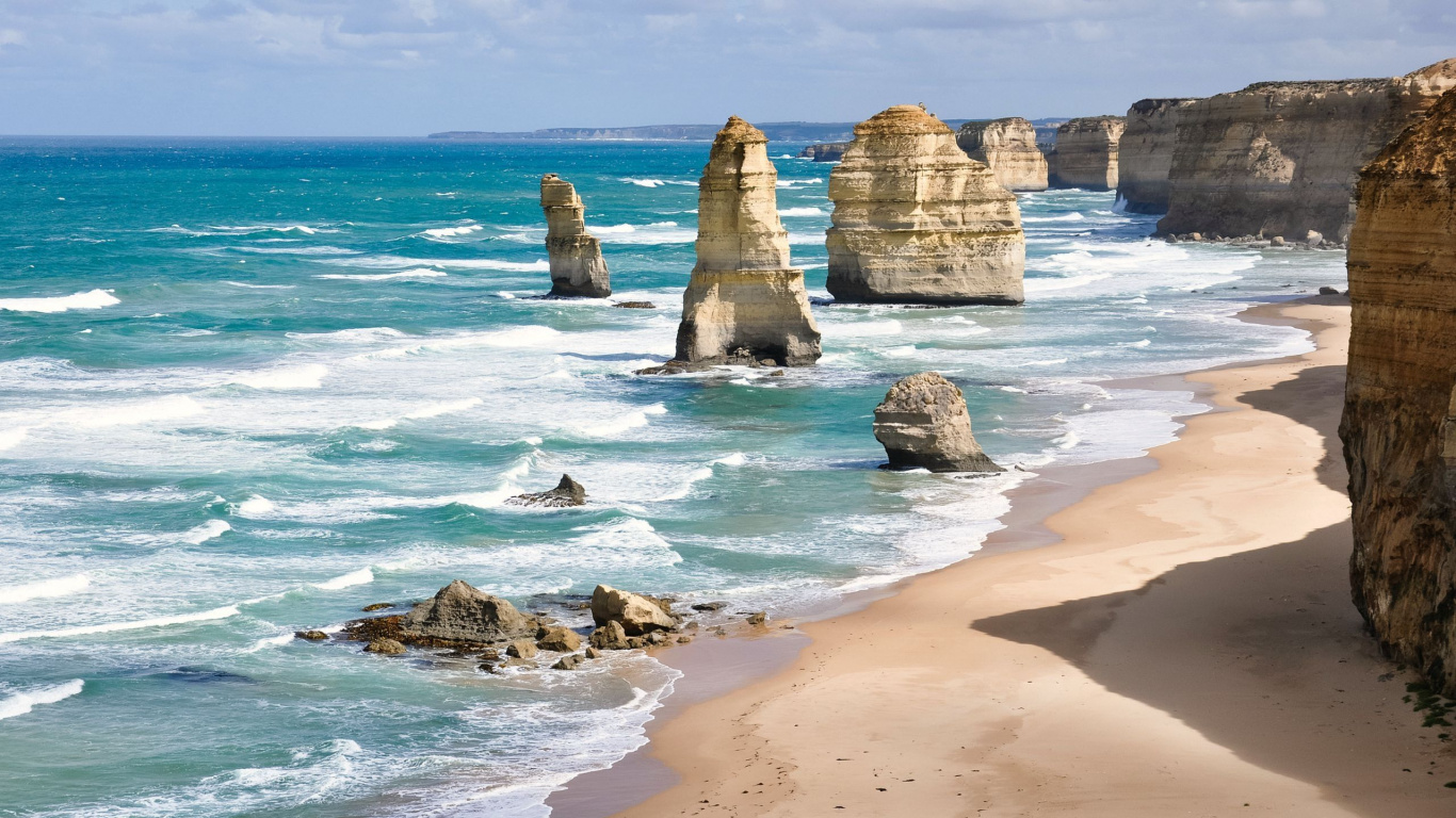 Brown Rock Formation on Sea Shore During Daytime. Wallpaper in 1366x768 Resolution