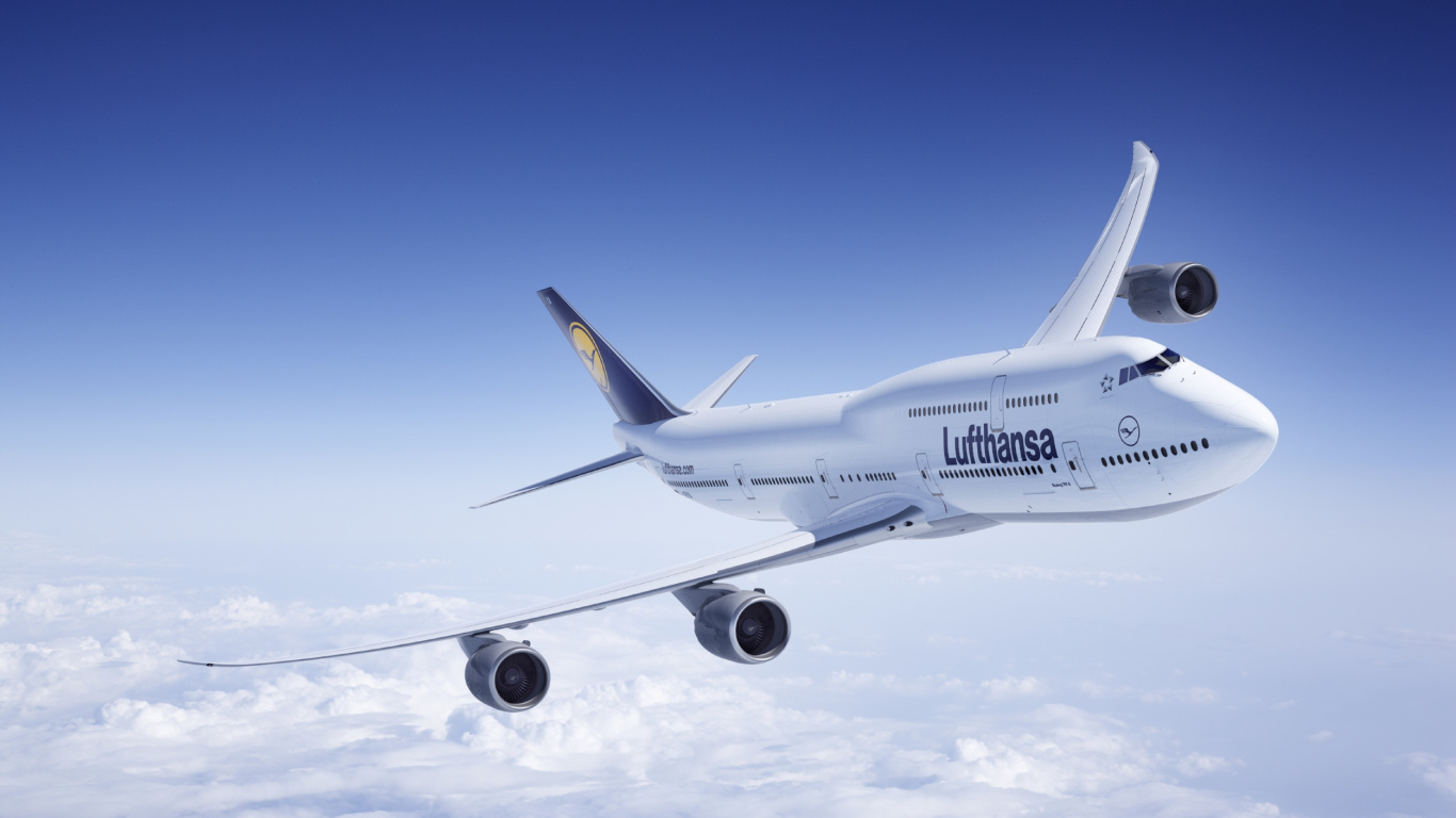 White and Blue Airplane Under Blue Sky During Daytime. Wallpaper in 1366x768 Resolution