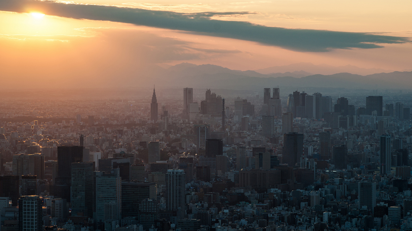 Vista Aérea de Los Edificios de la Ciudad Durante la Puesta de Sol. Wallpaper in 1366x768 Resolution