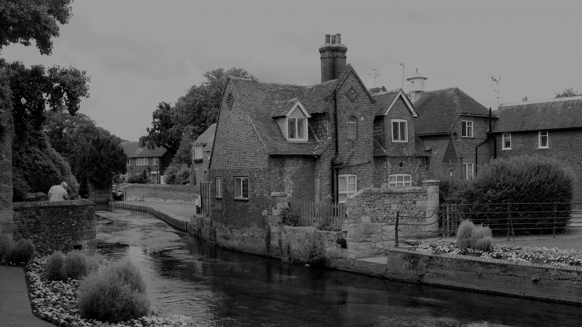 Grayscale Photo of Concrete House Near River. Wallpaper in 1920x1080 Resolution