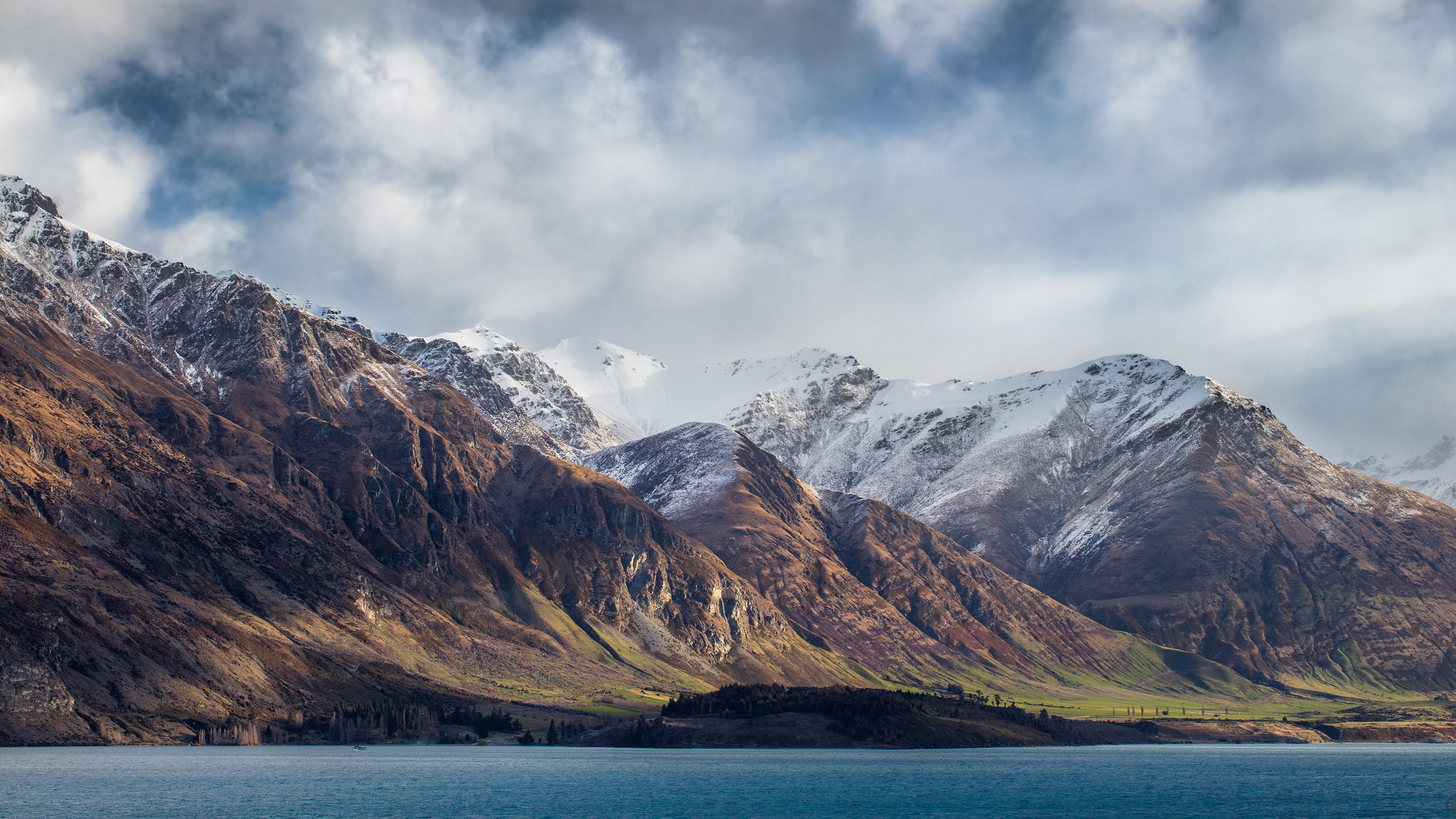 Snow Covered Mountain Near Body of Water During Daytime. Wallpaper in 3840x2160 Resolution