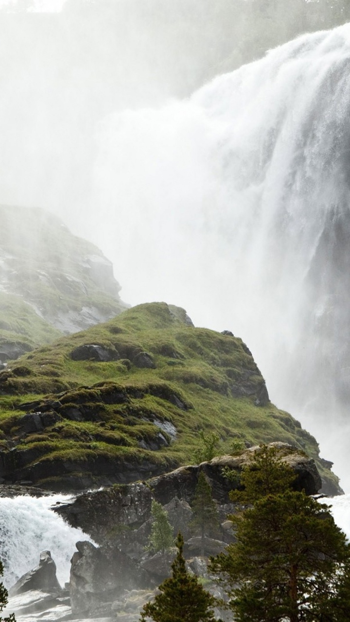 Green Moss on Rock Formation Near Waterfalls During Daytime. Wallpaper in 720x1280 Resolution