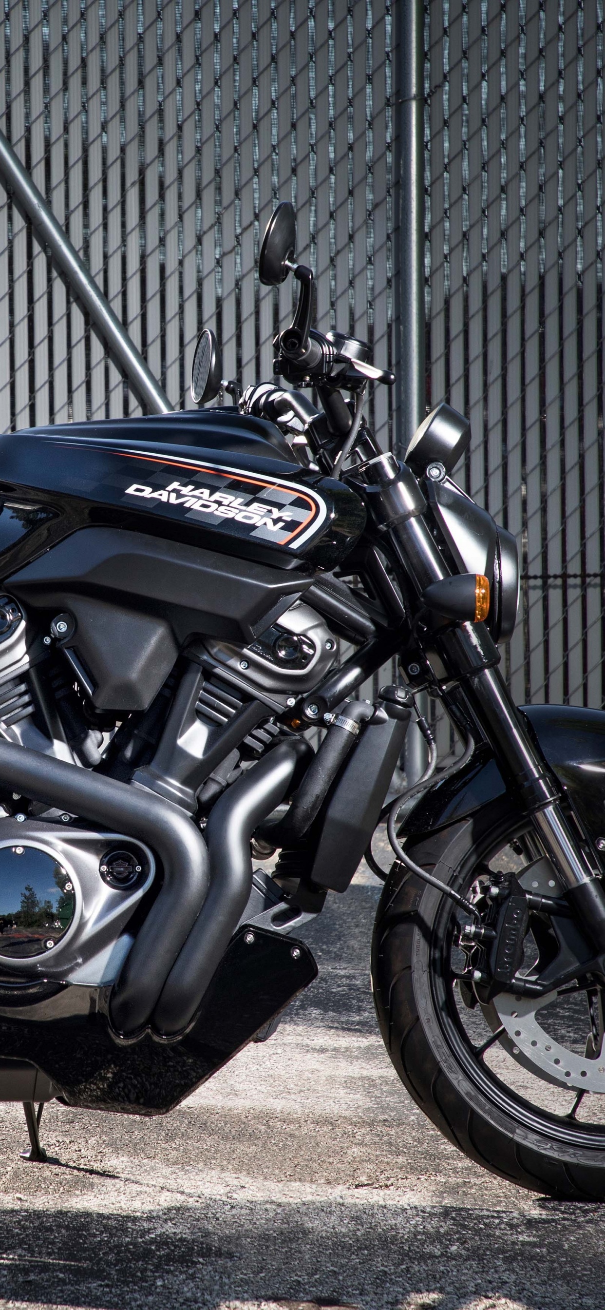 Black and Blue Cruiser Motorcycle. Wallpaper in 1242x2688 Resolution