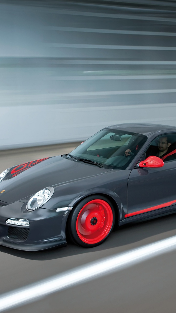 Red Porsche 911 on Road. Wallpaper in 720x1280 Resolution