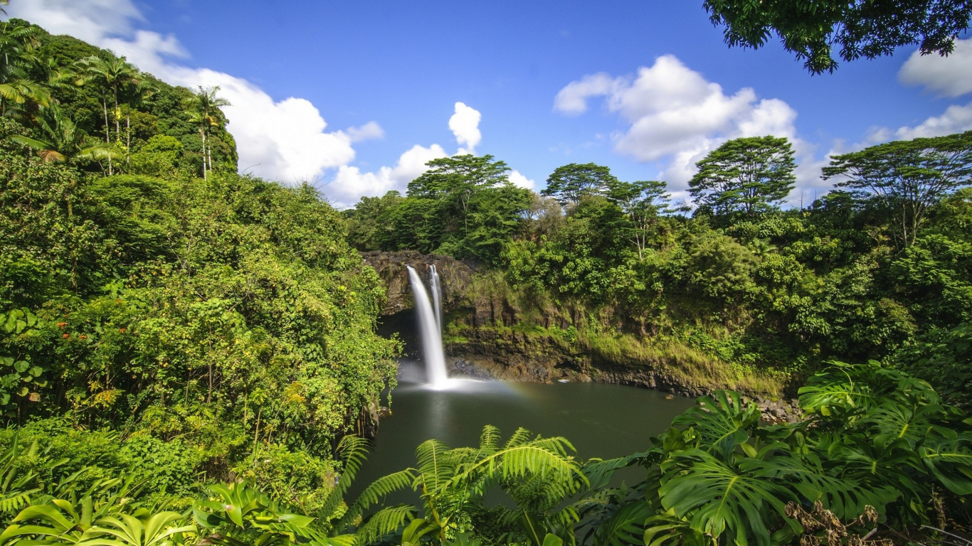 Green Trees Near Waterfalls Under Blue Sky During Daytime. Wallpaper in 1366x768 Resolution