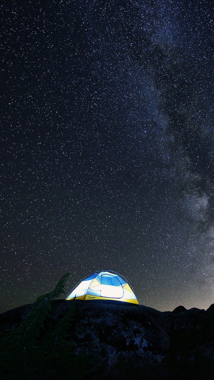 White Dome Tent on Black Rock Mountain Under Starry Night. Wallpaper in 720x1280 Resolution