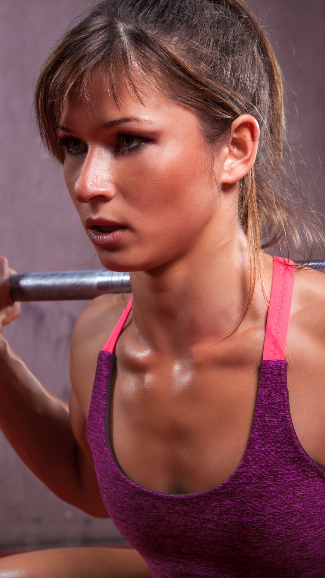Woman in Pink Tank Top Holding Barbell. Wallpaper in 1080x1920 Resolution