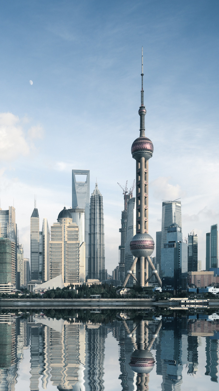 City Skyline Under Blue Sky During Daytime. Wallpaper in 750x1334 Resolution