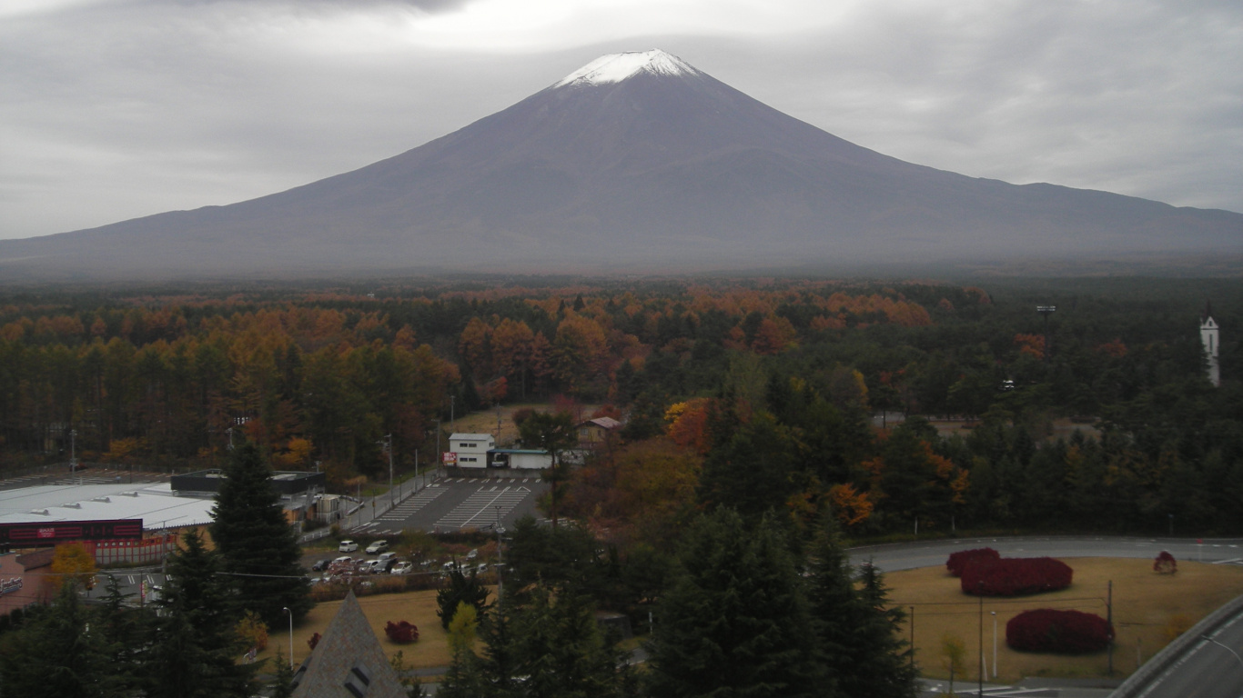 White Clouds Over Green Mountain. Wallpaper in 1366x768 Resolution