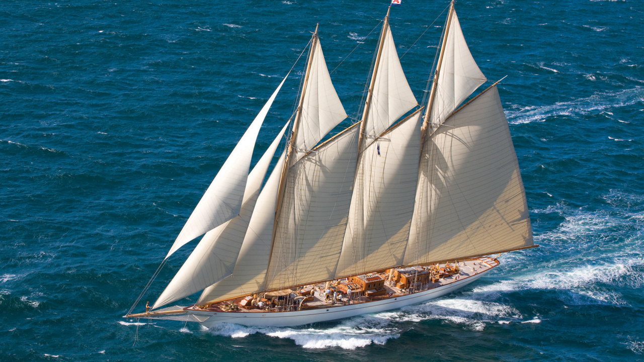 Brown and White Sail Boat on Blue Sea During Daytime. Wallpaper in 1280x720 Resolution