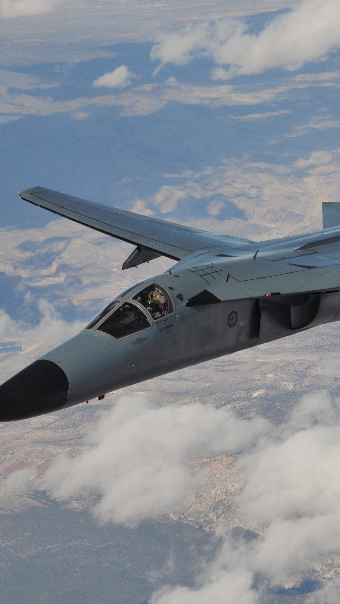 Black Fighter Jet Flying Over White Clouds During Daytime. Wallpaper in 1080x1920 Resolution