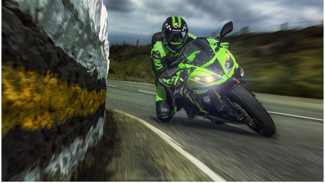 Homme en Costume de Moto Vert et Noir à Cheval Sur un Vélo de Sport Noir et Vert. Wallpaper in 1280x720 Resolution