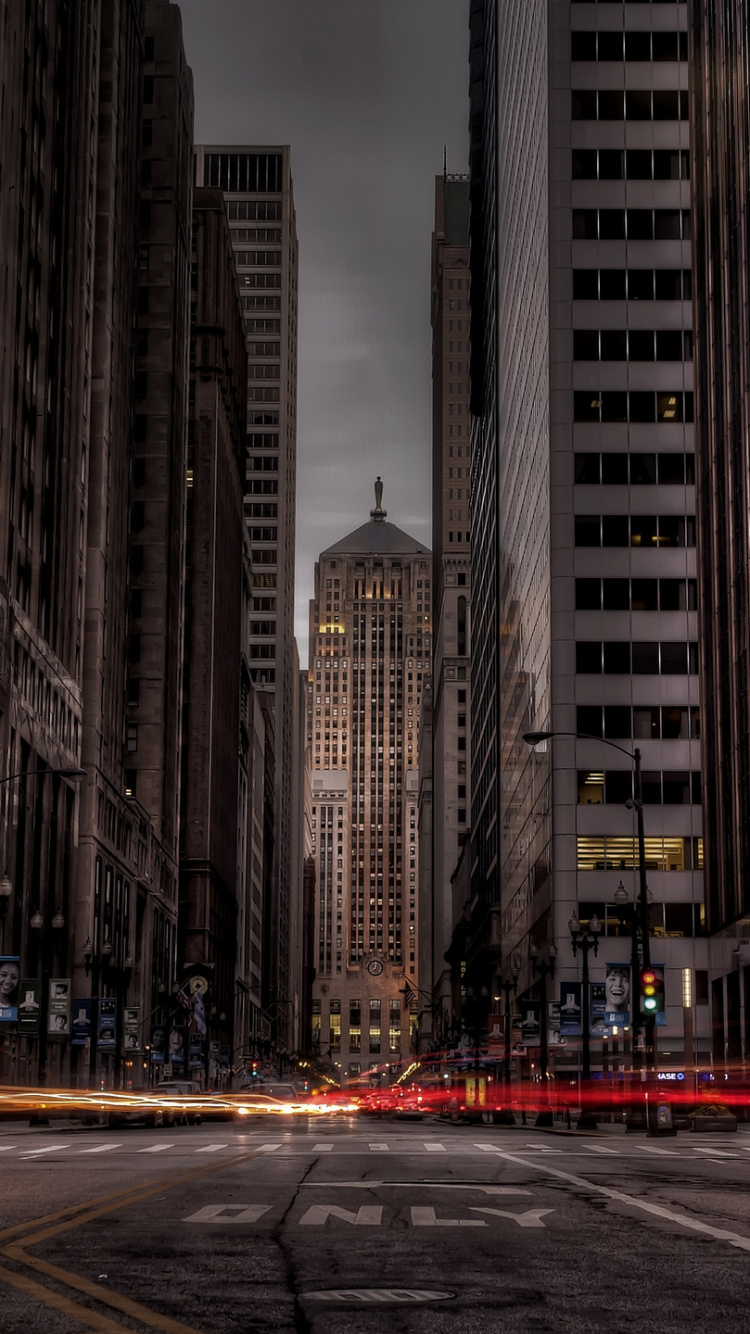 City Buildings With Lights Turned on During Night Time. Wallpaper in 750x1334 Resolution