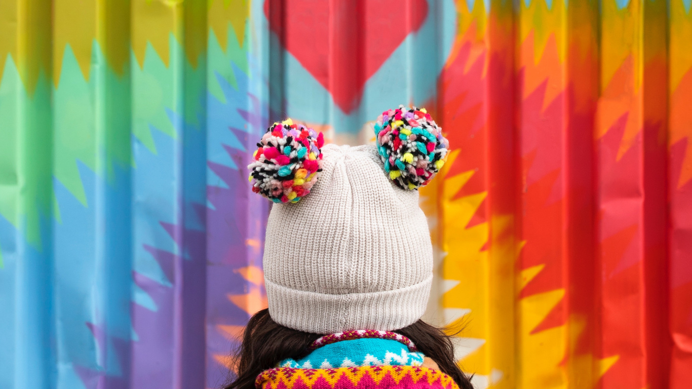 Person Wearing White Knit Cap and Brown Jacket. Wallpaper in 1366x768 Resolution