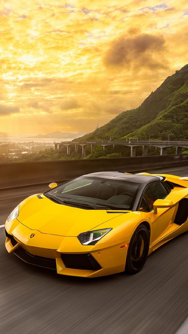 Lamborghini Aventador Jaune Sur Route Pendant la Journée. Wallpaper in 750x1334 Resolution